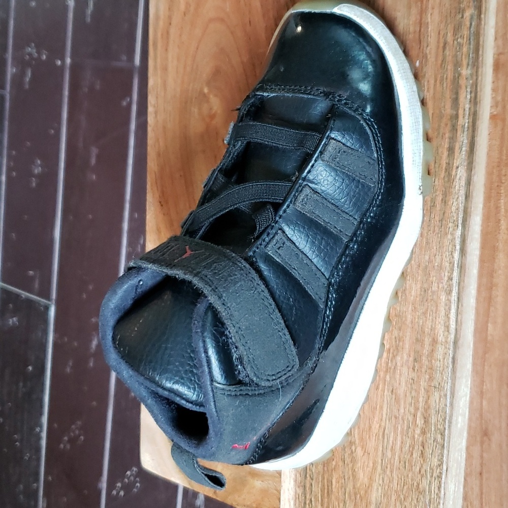 Nike Air Jordan black Toddler shoes.  Size 10C. Pre-owned Velcro & elastic close